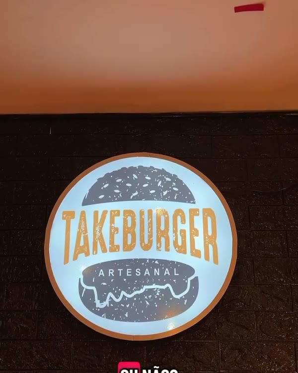 Logo iluminado da Take Burger